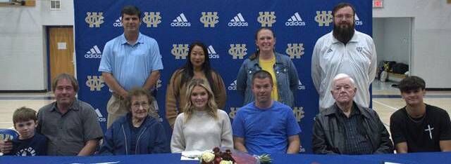 Wilson Central trio sign college scholarships